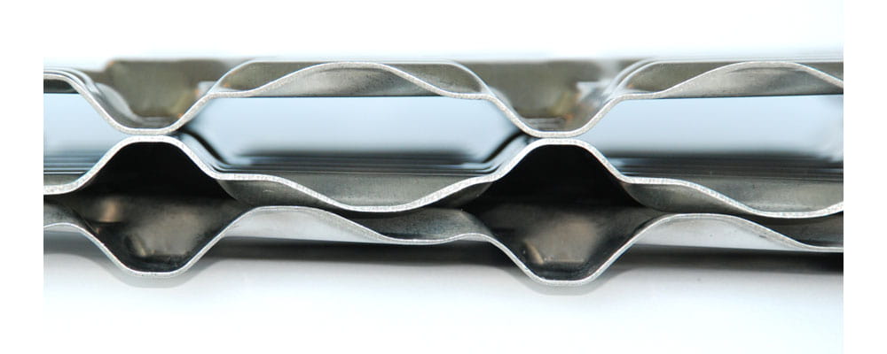 Echangeur de chaleur anti-encrassement pour fluides charg&eacute;s